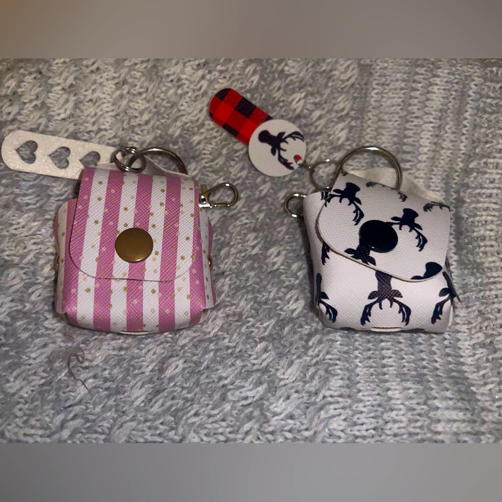 Set of 2 air pods keychain holders. Two pack. Cute designs.